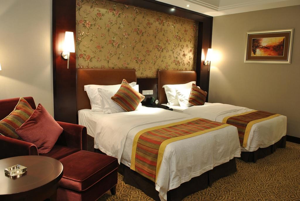Qingyuan International Hotel Rum bild